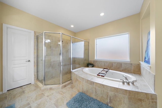 bathroom featuring shower with separate bathtub and tile patterned floors