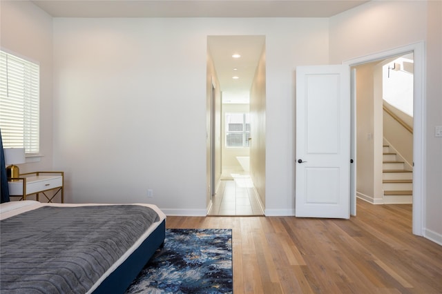 bedroom with hardwood / wood-style flooring