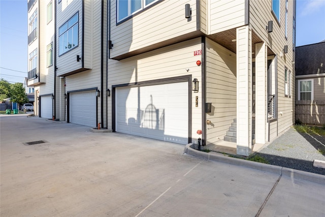 view of property exterior with a garage