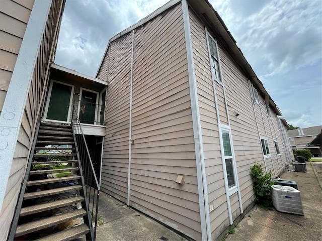 view of home's exterior with central air condition unit