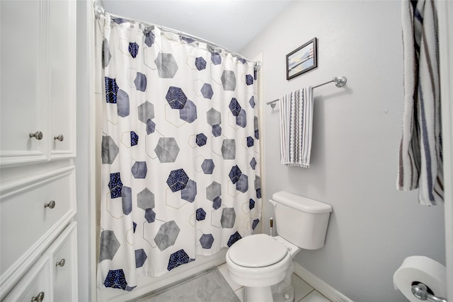 bathroom featuring tile patterned floors and toilet