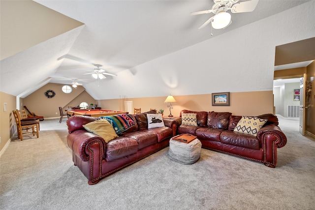 carpeted living room with vaulted ceiling and ceiling fan