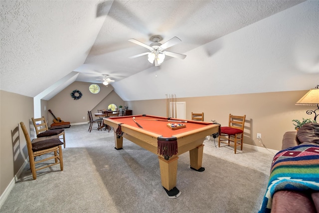 rec room with ceiling fan, billiards, a textured ceiling, vaulted ceiling, and light carpet