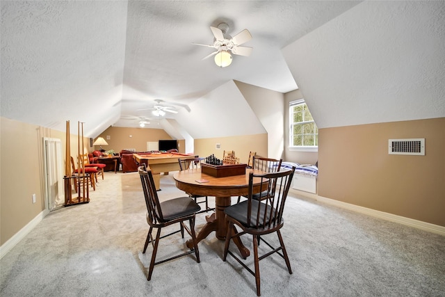 carpeted dining space with a textured ceiling, ceiling fan, lofted ceiling, and billiards