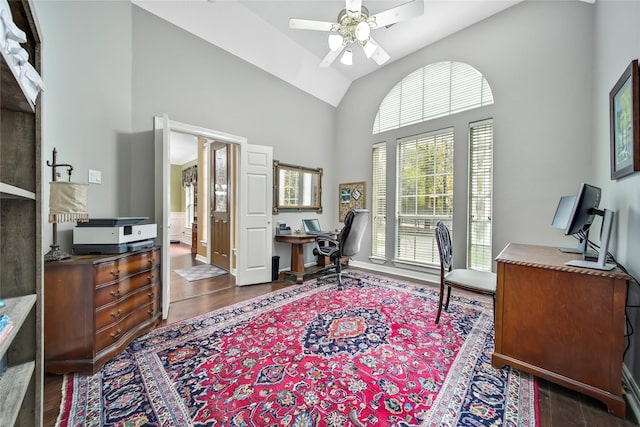 office featuring ceiling fan, dark hardwood / wood-style flooring, and a healthy amount of sunlight