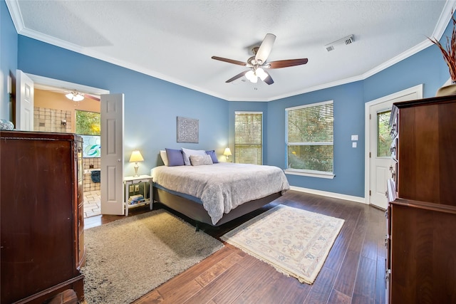 bedroom with a textured ceiling, dark hardwood / wood-style flooring, ceiling fan, and crown molding