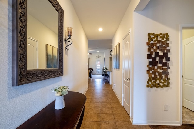 hallway featuring tile patterned floors