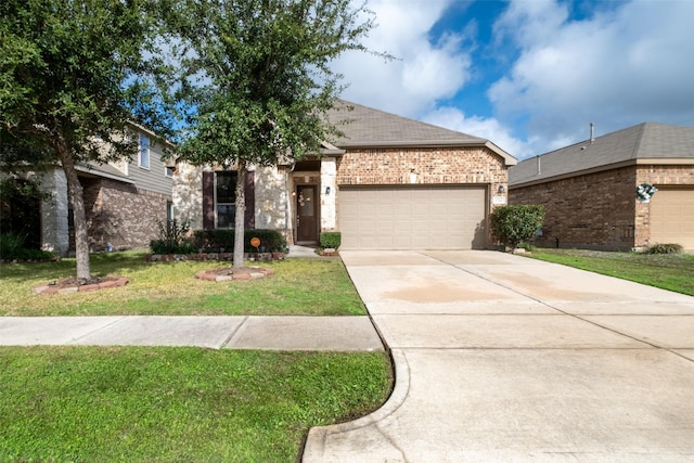 view of front of property featuring a garage and a front lawn