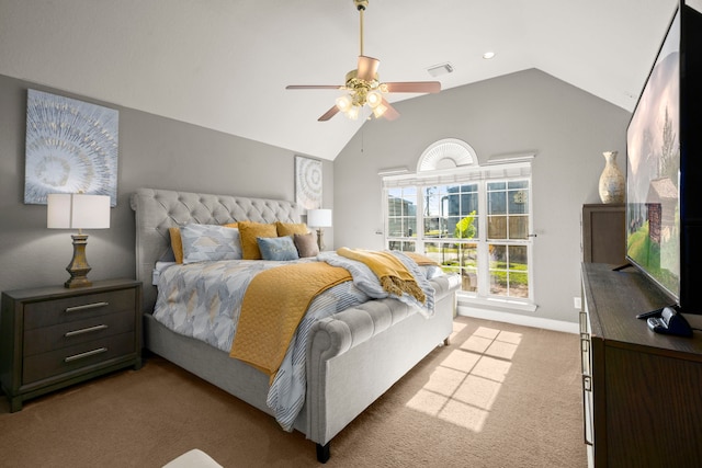 bedroom with ceiling fan, light carpet, and vaulted ceiling