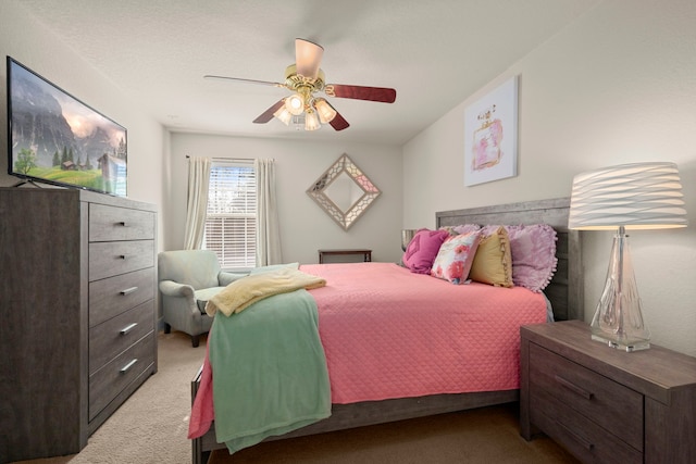 bedroom featuring ceiling fan and light colored carpet