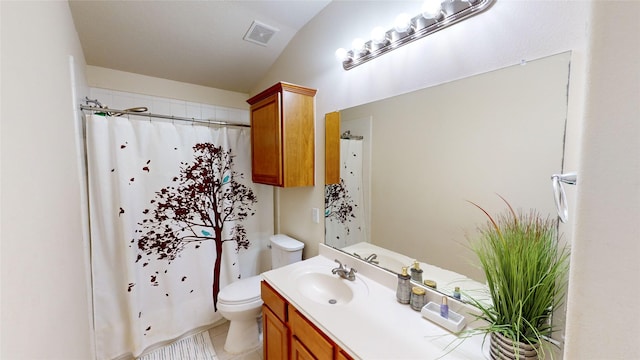 bathroom with a shower with curtain, vanity, and toilet