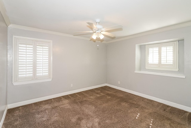 carpeted spare room featuring ceiling fan and ornamental molding