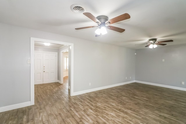 unfurnished room featuring wood-type flooring and ceiling fan