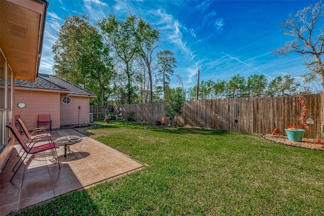 view of yard with a patio area