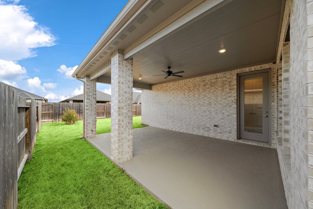 view of patio featuring ceiling fan