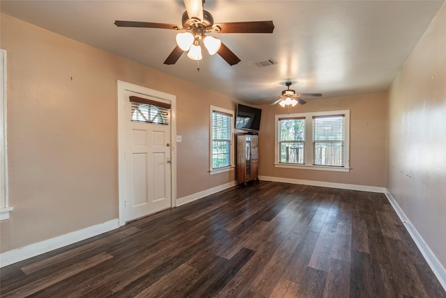 entrance foyer with dark hardwood / wood-style floors and ceiling fan