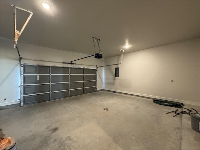 garage with baseboards, electric panel, and a garage door opener