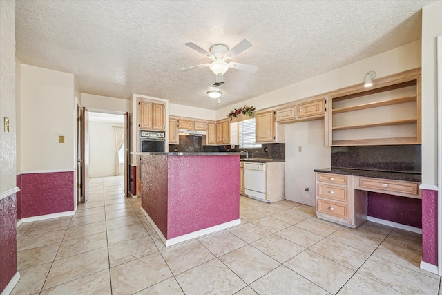 kitchen with ceiling fan, a kitchen island, white dishwasher, oven, and light tile patterned flooring