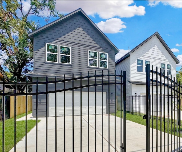 view of gate featuring a garage