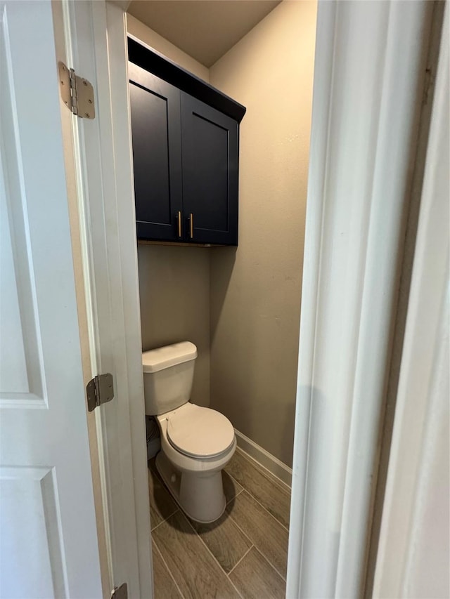 bathroom featuring toilet