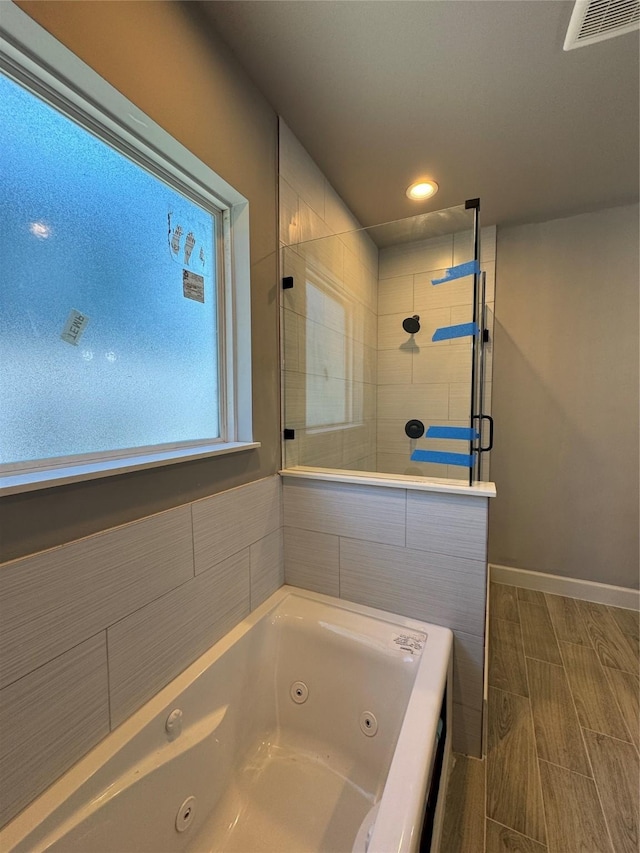 bathroom with independent shower and bath