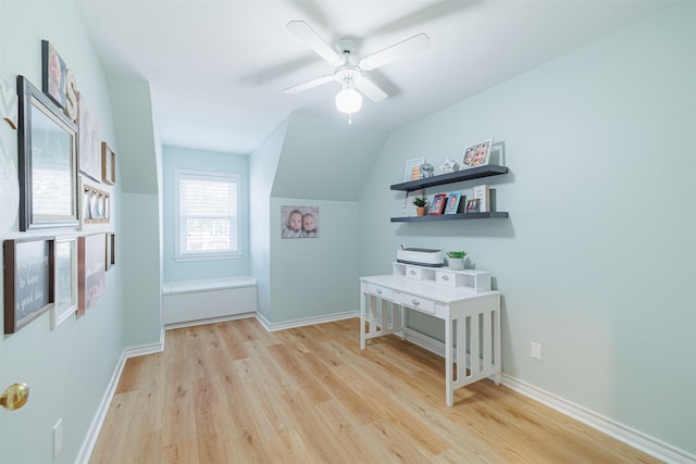 interior space with light hardwood / wood-style floors, vaulted ceiling, and ceiling fan