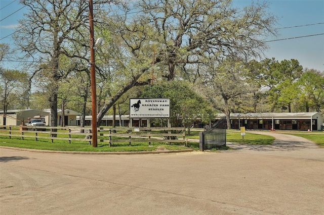 view of community featuring a yard