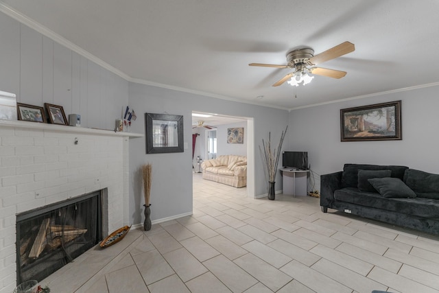 living room featuring ceiling fan, a fireplace, and ornamental molding