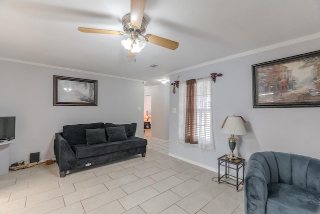 living room with ceiling fan and ornamental molding