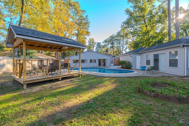 view of yard featuring a swimming pool side deck