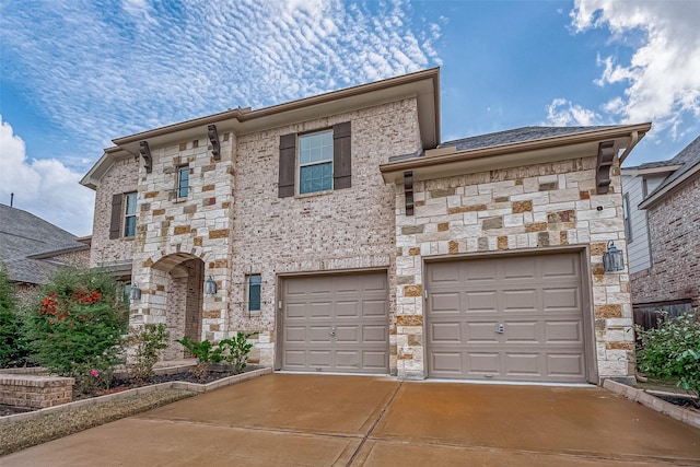 view of front of home with a garage