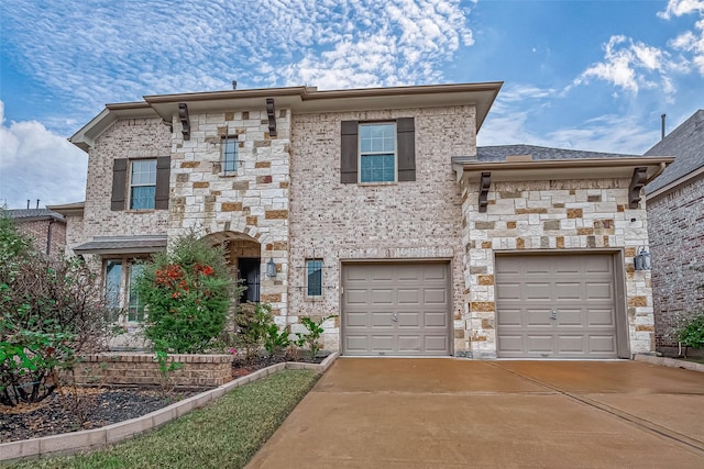 view of front of property with a garage