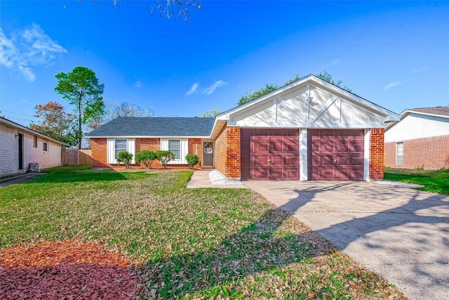 ranch-style house featuring a front yard and a garage