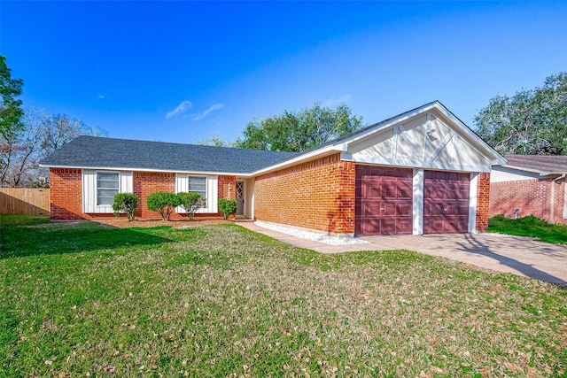 ranch-style home featuring a front yard and a garage