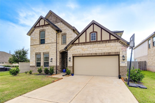 view of front of house featuring a garage and a front yard