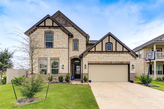 view of front of home featuring a front yard and a garage