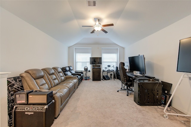 office space with light carpet, ceiling fan, and lofted ceiling