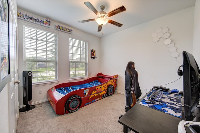 carpeted bedroom with ceiling fan