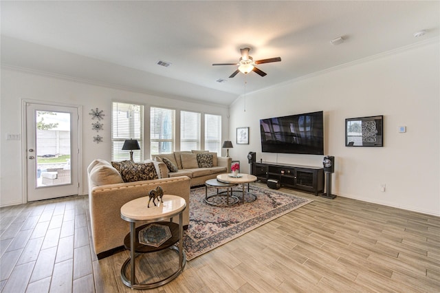 living room with light hardwood / wood-style floors, a wealth of natural light, crown molding, and ceiling fan