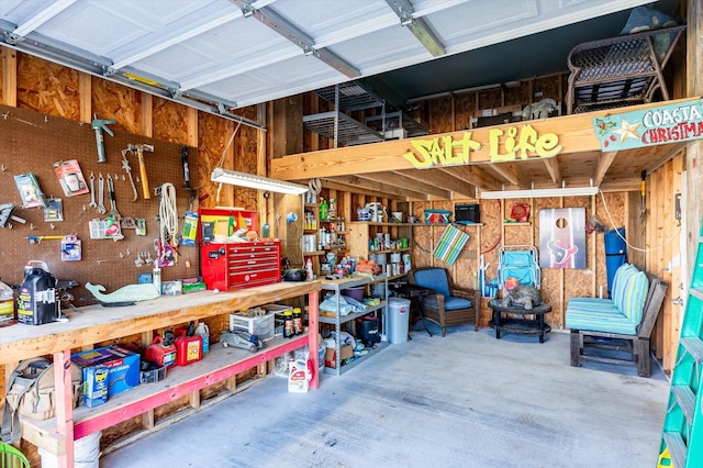 garage with a workshop area