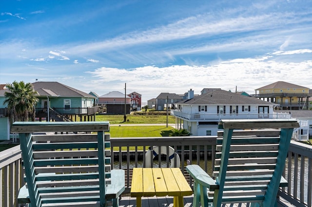 deck featuring a dock and a water view