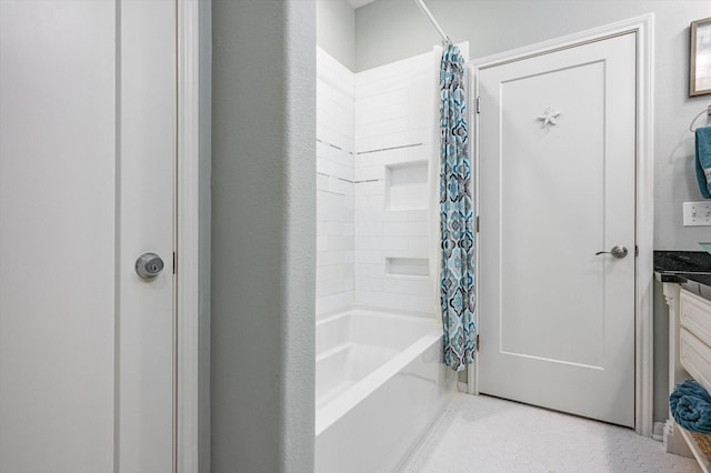 bathroom with shower / bathtub combination with curtain