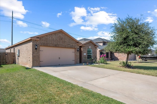 view of front facade with a garage and a front yard