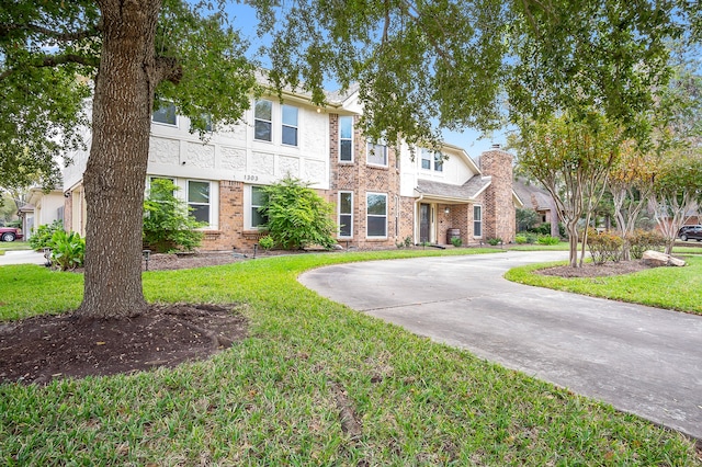 view of front of home with a front yard