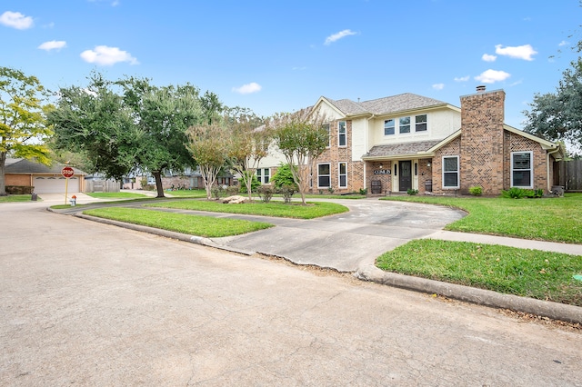 view of front of home with a front yard