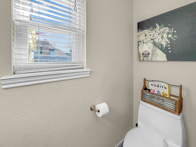 bathroom featuring plenty of natural light