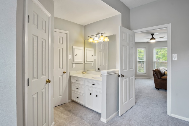 bathroom featuring vanity and ceiling fan