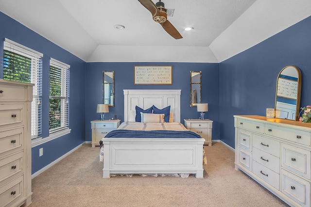 bedroom with light carpet, ceiling fan, and lofted ceiling