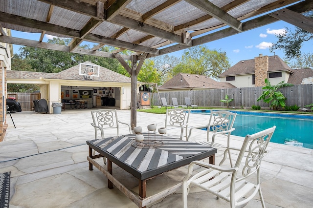 view of patio featuring a fenced in pool and a pergola