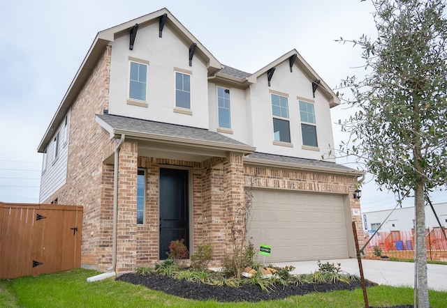 view of front of home with a garage